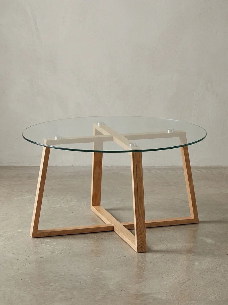 Couchtisch in Eiche mit transparenter Glasplatte und überkreuztem Gestell, modernes Design